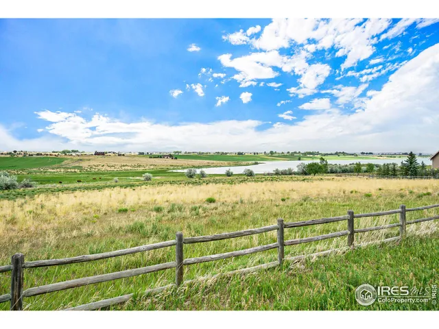 a view of a city and lake