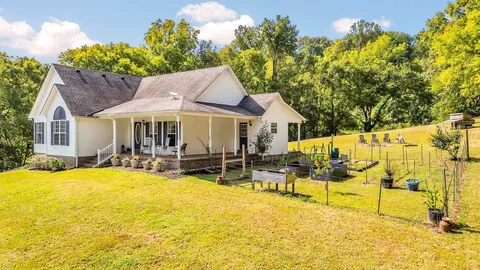 a bed room with a bed and a window