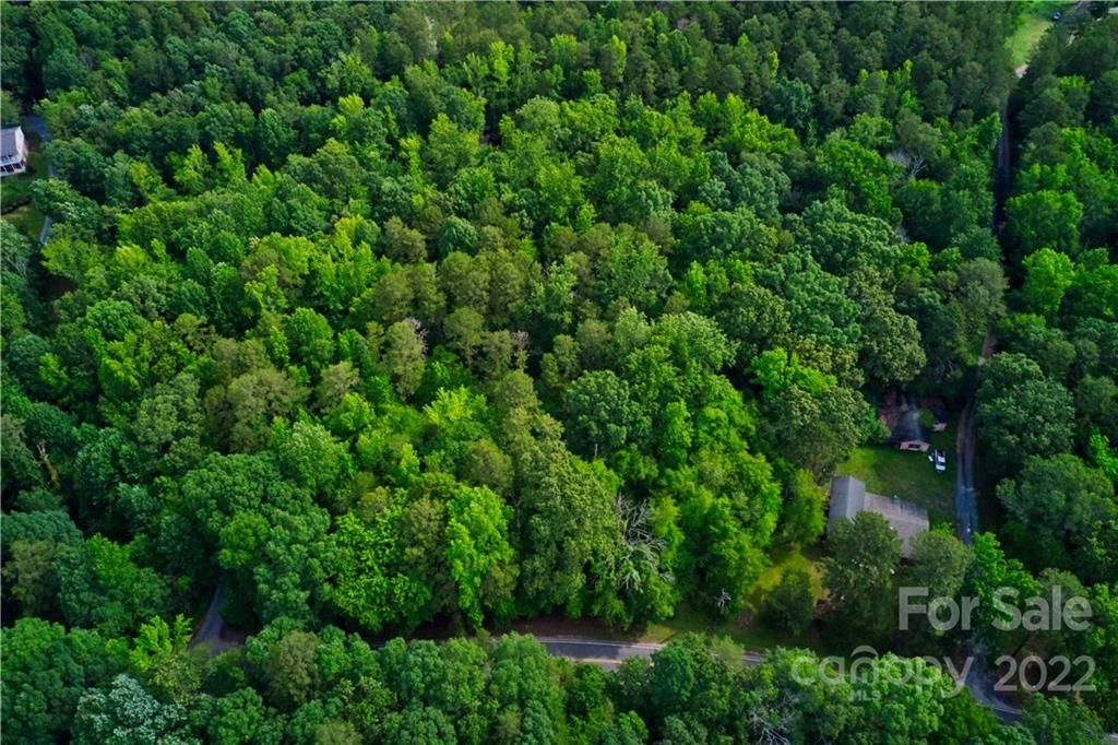 650 Union Road Matthews, NC 28104 - Photo 4 of 9 an aerial view of residential house with outdoor space and trees all around