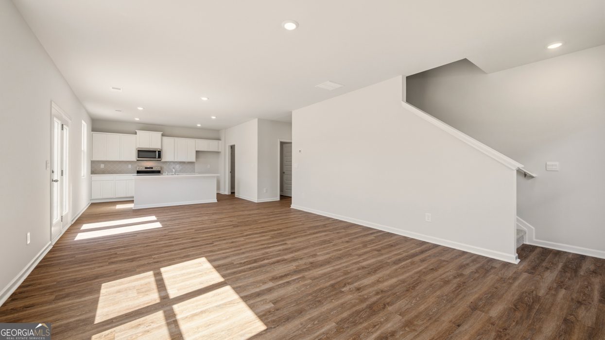 8578 Seabiscuit Road Lithonia, GA 30058 - Photo 14 of 30 a view of kitchen with wooden floor