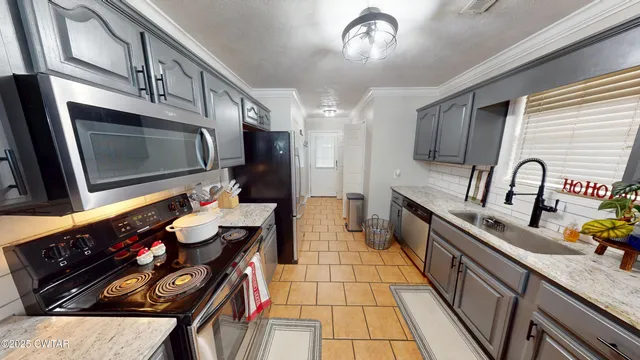 a bedroom with a bed and a mirror