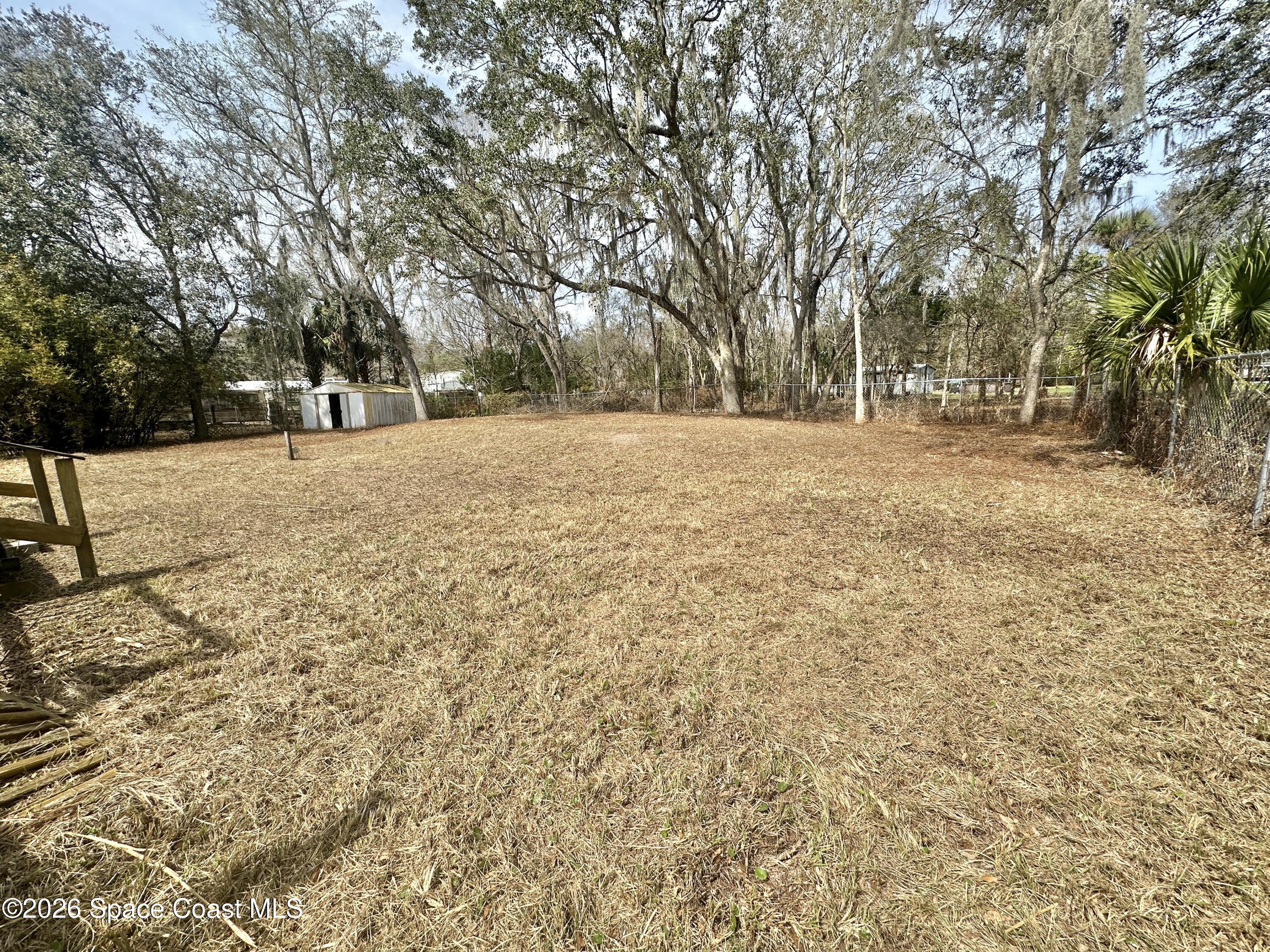 3550 Arbor Avenue Bunnell, FL 32110 - Photo 20 of 21 a view of outdoor space with trees