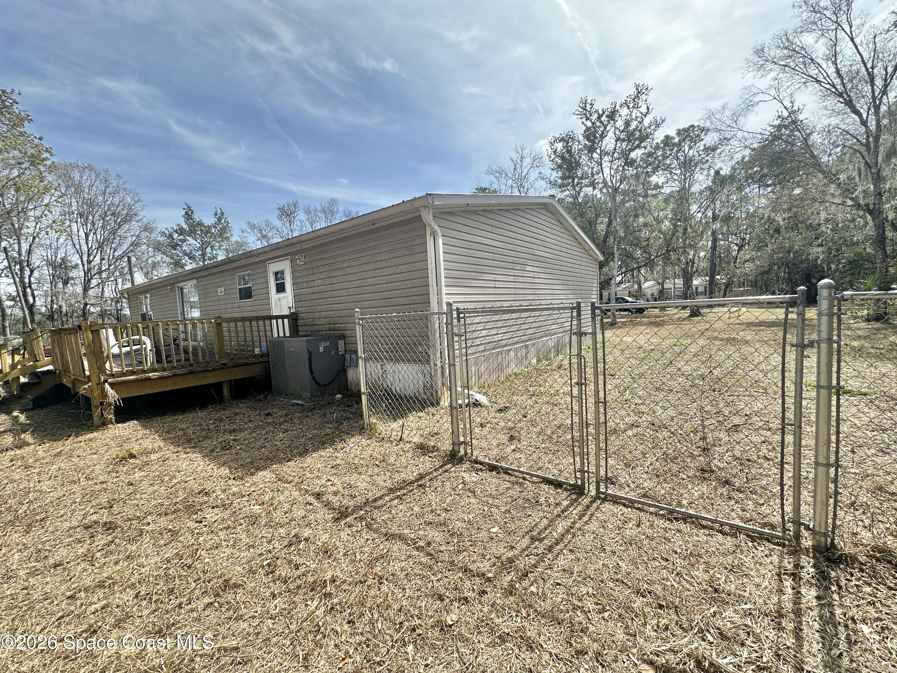 3550 Arbor Avenue Bunnell, FL 32110 - Photo 2 of 21 a view of a house with a yard