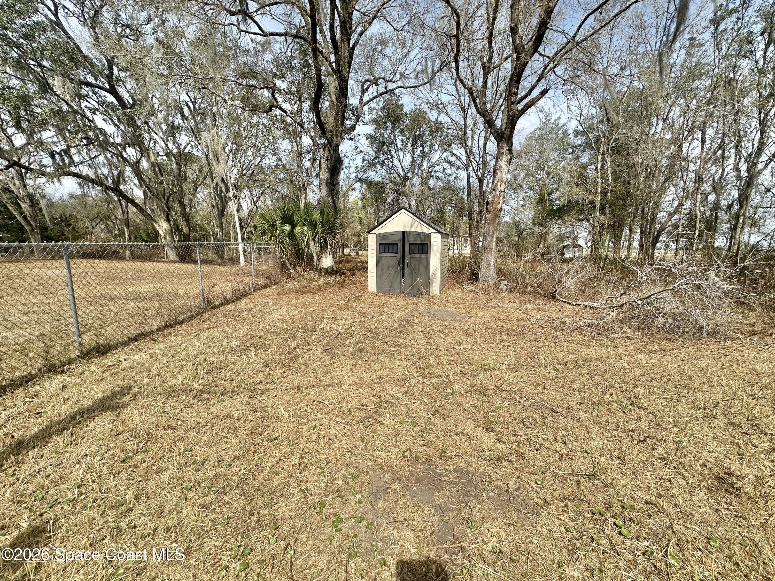 3550 Arbor Avenue Bunnell, FL 32110 - Photo 21 of 21 a front view of a house with a yard
