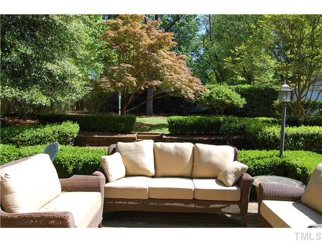 118 Hudson Street Raleigh, NC 27608 - Photo 12 of 12 Spectacular backyard!!!! beautifully landscaped! Extra large deck adds another room to the house!!...great for entertaining! Deep lot provides definite addon potential!.. Notice the garage back right. Lot extends just behind that. Back Yard