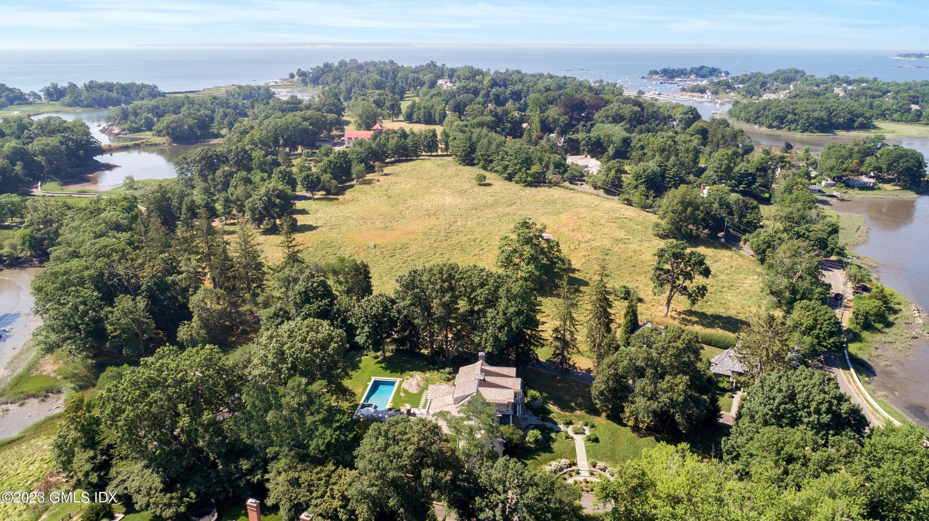 150 Goodwives River Road Darien, CT 06820 - Photo 36 of 39 an aerial view of mountain with trees around