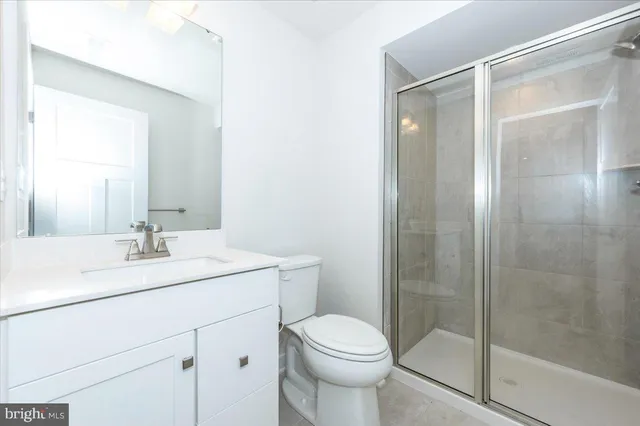 a front view of a house with a big yard