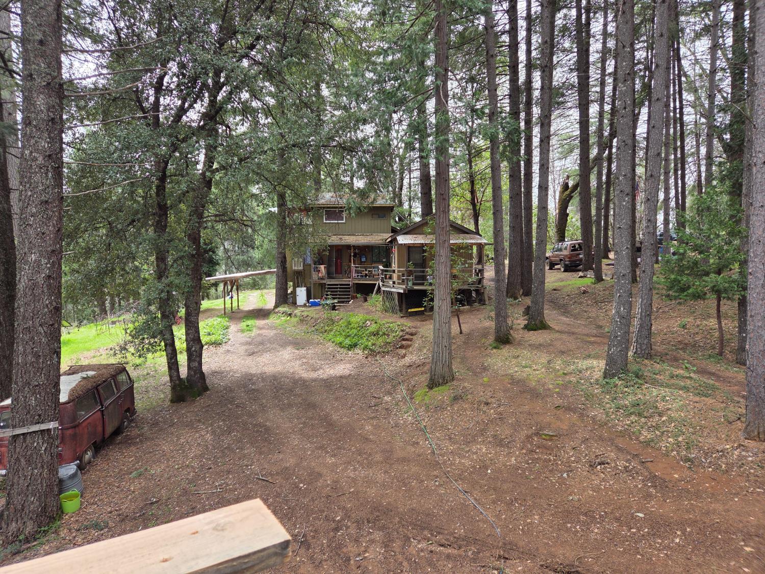 18755 North Canyon Road Nevada City, CA 95959 - Photo 1 of 1 a view of a park with swings and slides