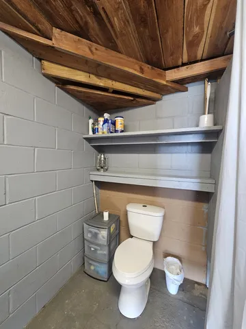 a view of a two chairs on the roof deck