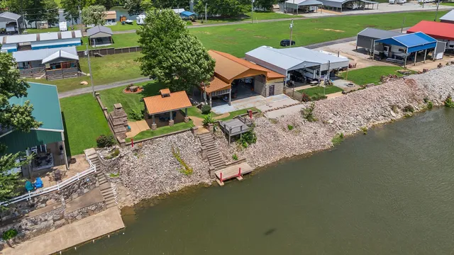 a bedroom with a bed and a television in it