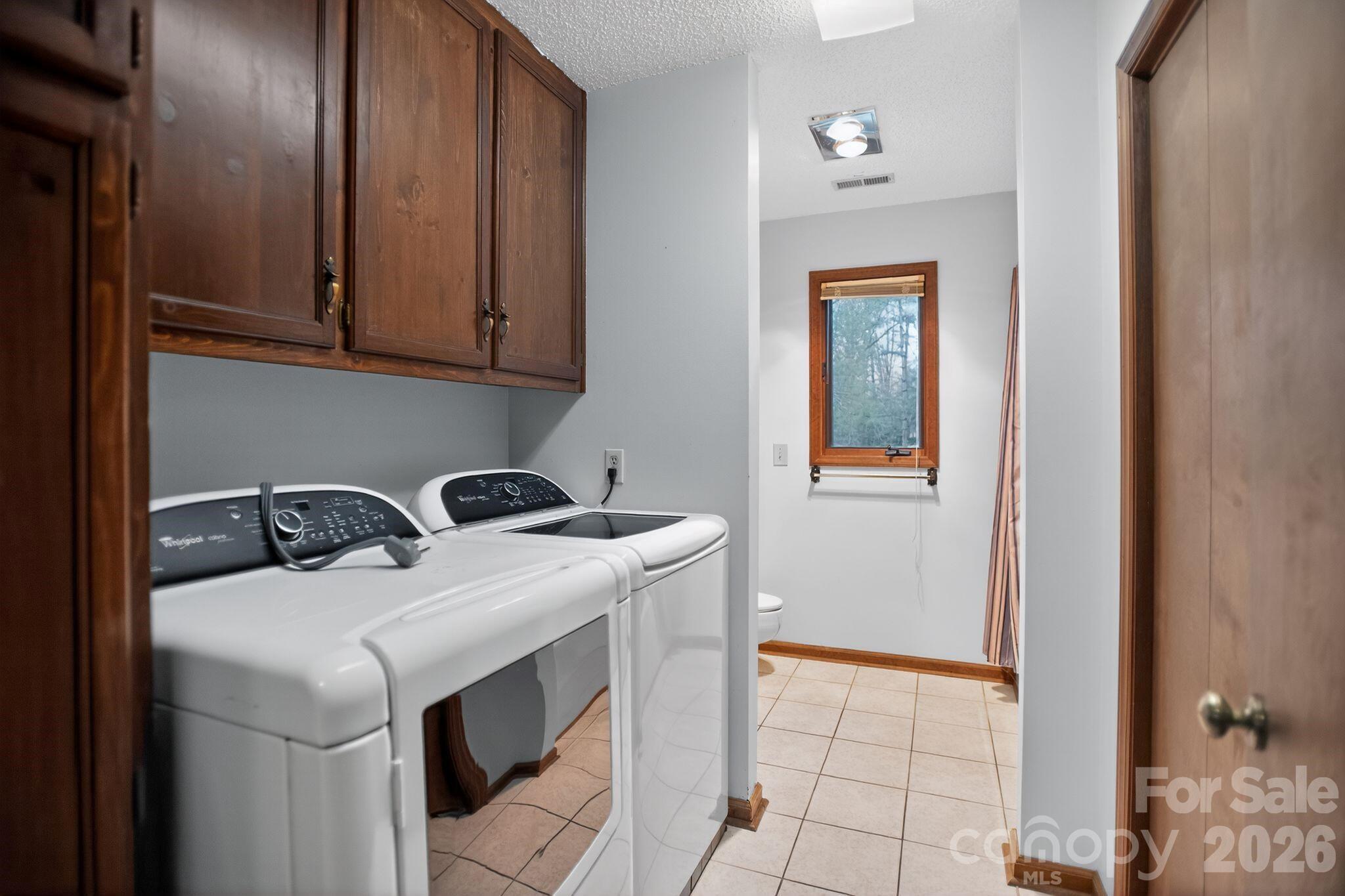 4783 Calico Road Lenoir, NC 28645 - Photo 25 of 44 a utility room with dryer and washer