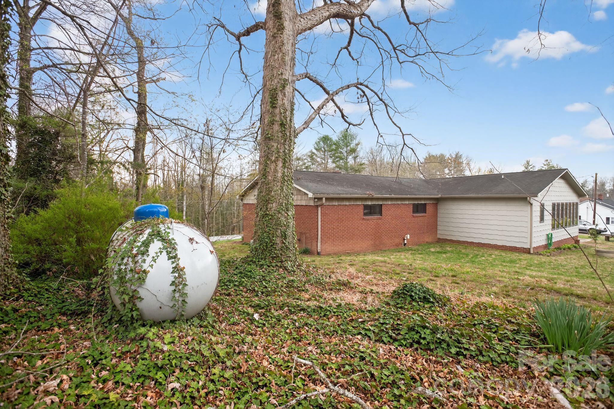 4783 Calico Road Lenoir, NC 28645 - Photo 36 of 44 a view of a backyard of the house