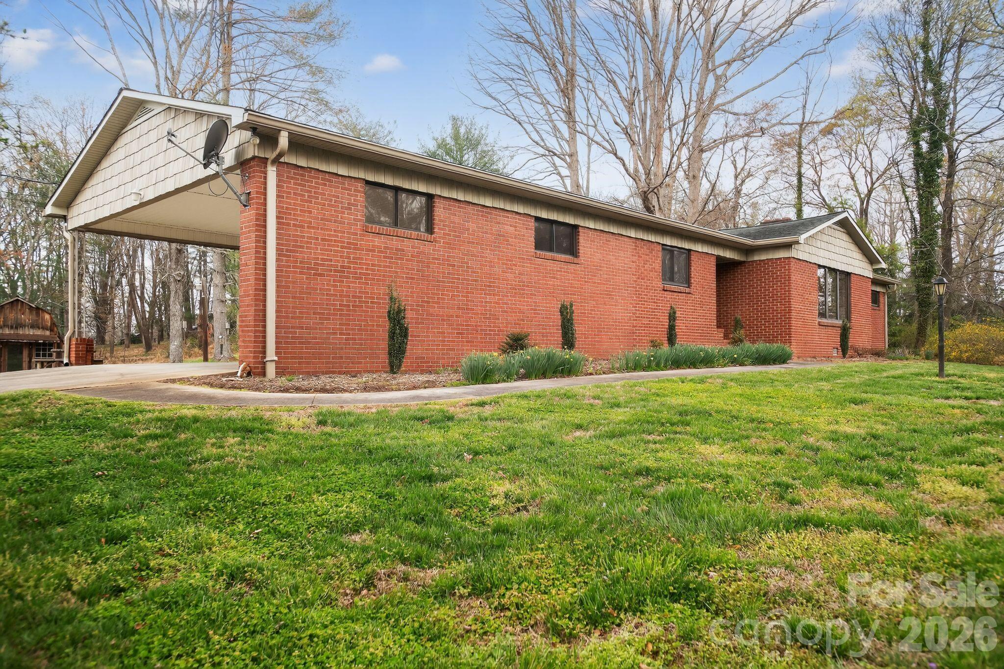 4783 Calico Road Lenoir, NC 28645 - Photo 5 of 44 a front view of house with yard