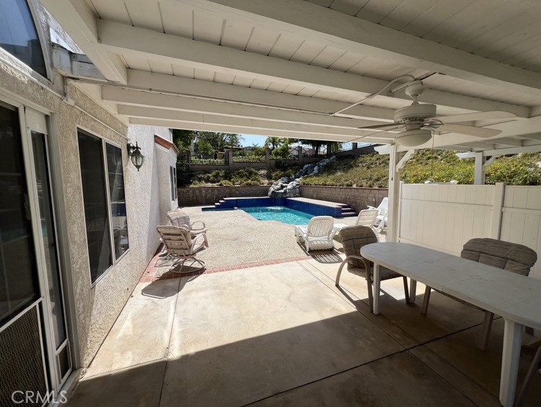 25225 Sagecrest Circle Stevenson Ranch, CA 91381 - Photo 12 of 50 Covered patio out to pool