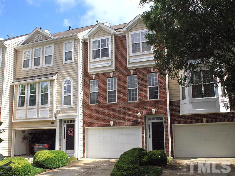 6907 Middleboro Drive Raleigh, NC 27612 - Photo 1 of 15 a front view of a house with a yard