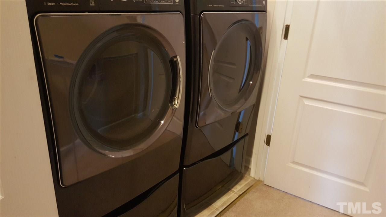 6907 Middleboro Drive Raleigh, NC 27612 - Photo 12 of 15 a close up view of a washer and dryer