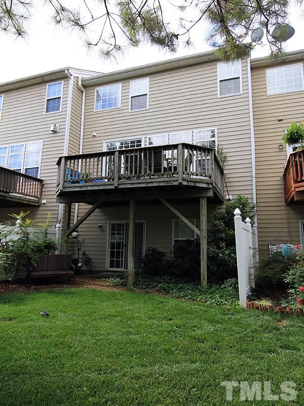 6907 Middleboro Drive Raleigh, NC 27612 - Photo 13 of 15 a view of a house with a yard