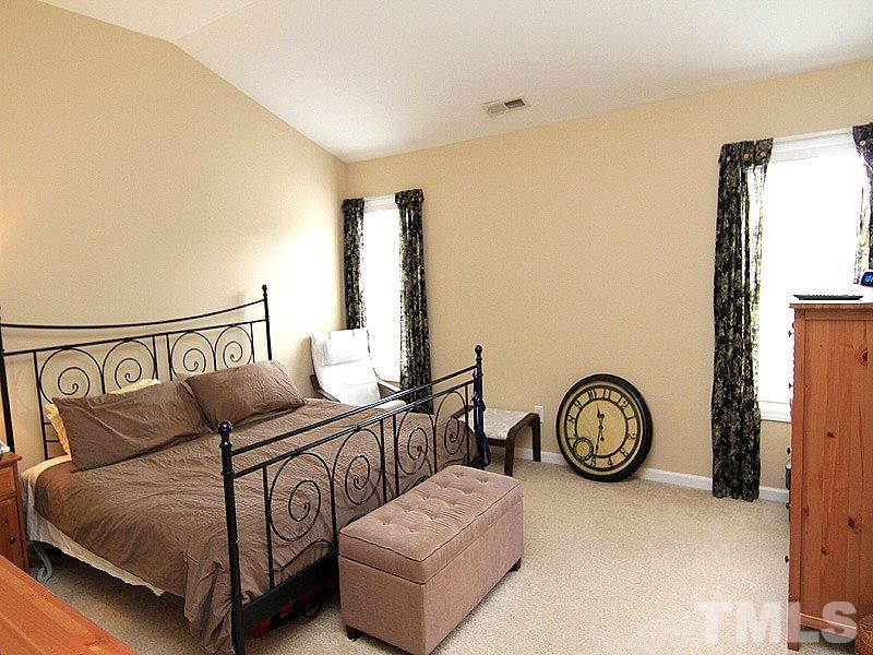6907 Middleboro Drive Raleigh, NC 27612 - Photo 7 of 15 a view of a furniture and wooden floor