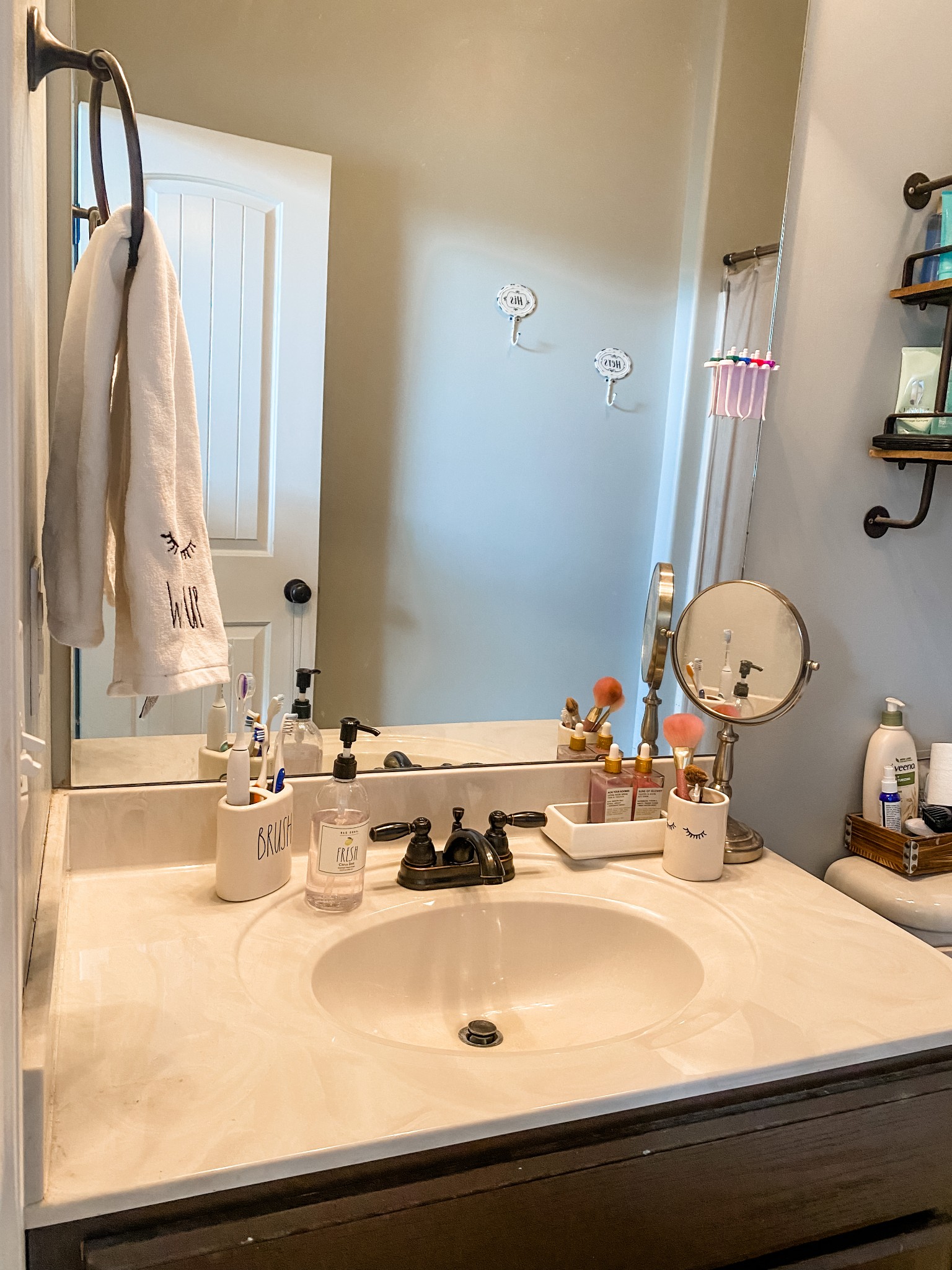 169 Camargo Road Fayetteville, TN 37334 - Photo 22 of 27 a bathroom with a sink and a mirror with toilet