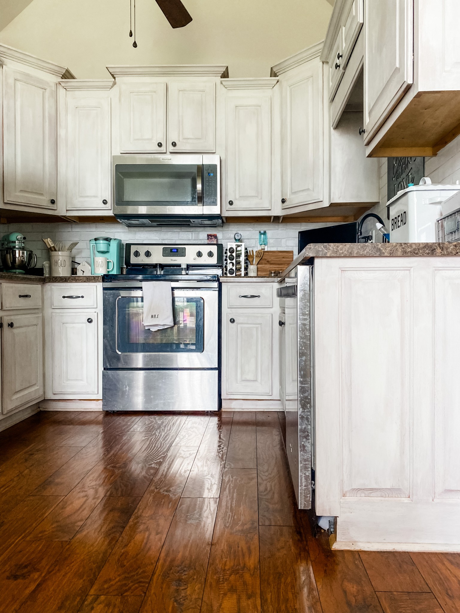 169 Camargo Road Fayetteville, TN 37334 - Photo 5 of 27 a kitchen with stainless steel appliances granite countertop a stove a sink and white cabinets