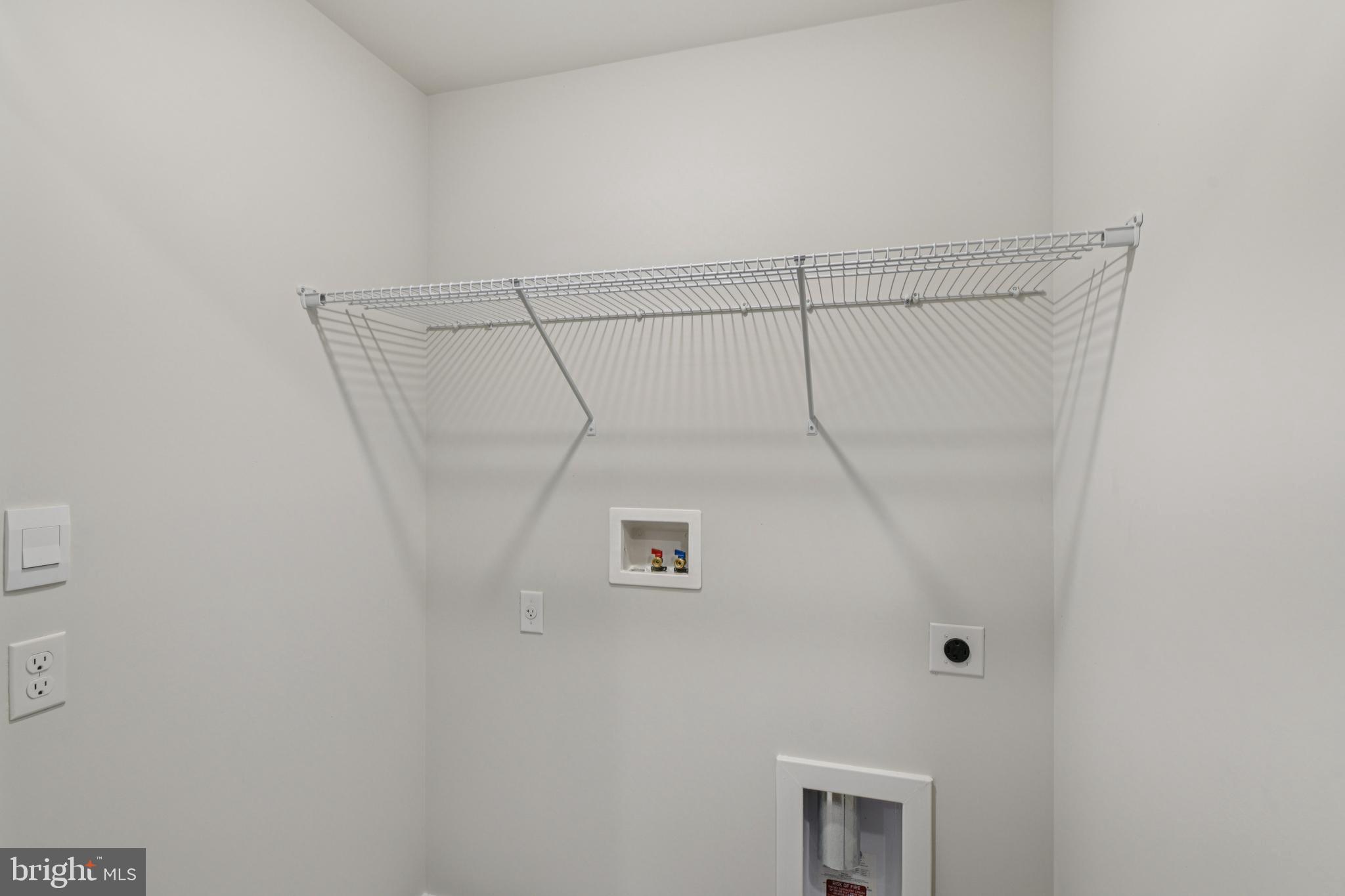 7406 Calm Retreat Boulevard Brandywine, MD 20613 - Photo 22 of 37 a bathroom with a shower