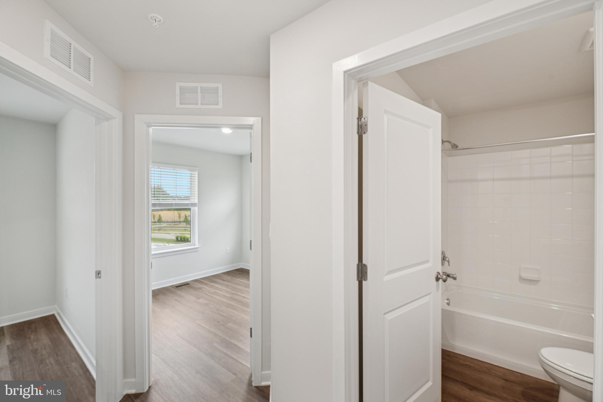7406 Calm Retreat Boulevard Brandywine, MD 20613 - Photo 28 of 37 a view of a bathroom from a hallway