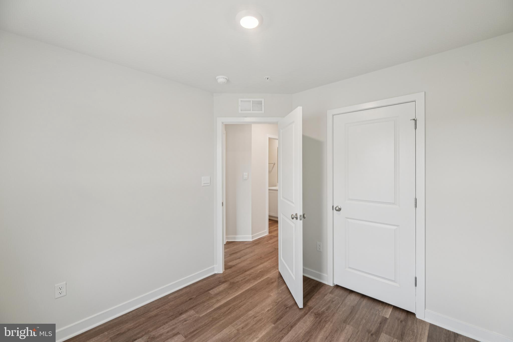7406 Calm Retreat Boulevard Brandywine, MD 20613 - Photo 30 of 37 a view of a room with wooden floor