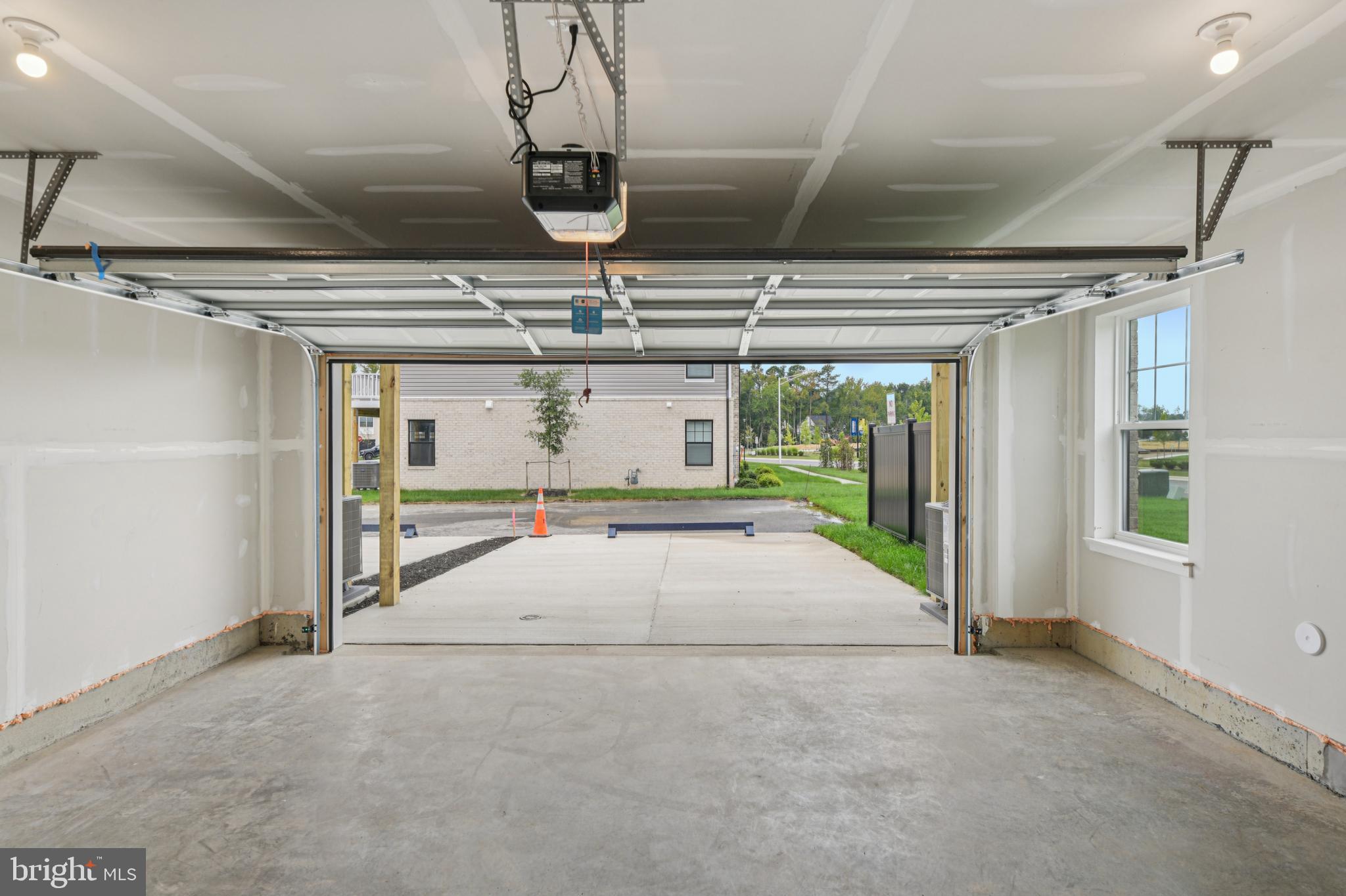 7406 Calm Retreat Boulevard Brandywine, MD 20613 - Photo 37 of 37 a big room with chandelier and windows