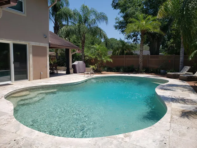a bathroom with a sink a mirror and a toilet