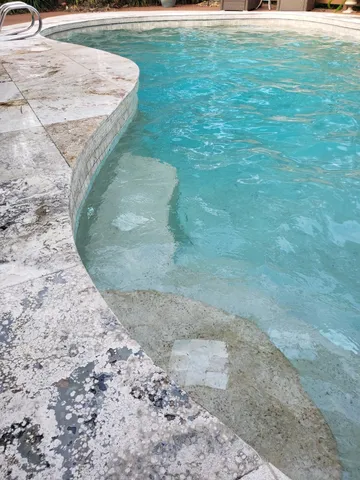 a view of storage and utility room with washer and dryer