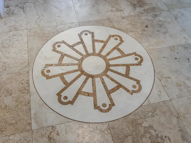 a kitchen with stainless steel appliances a sink a stove and cabinets