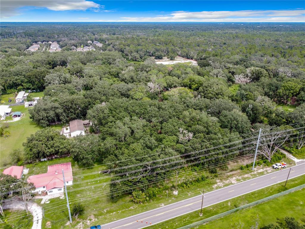 16206 Boyette Road Riverview, FL 33569 - Photo 12 of 16 a view of a yard with an outdoor seating