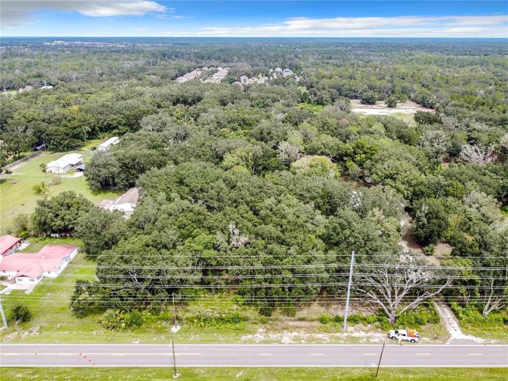 16206 Boyette Road Riverview, FL 33569 - Photo 14 of 16 a view of a yard with an outdoor space