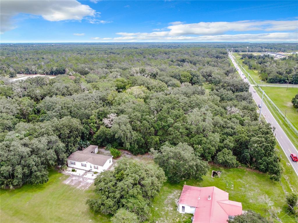 16206 Boyette Road Riverview, FL 33569 - Photo 9 of 16 an aerial view of a house with a yard