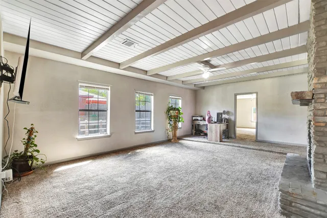 a view of a livingroom with a patio and a couch