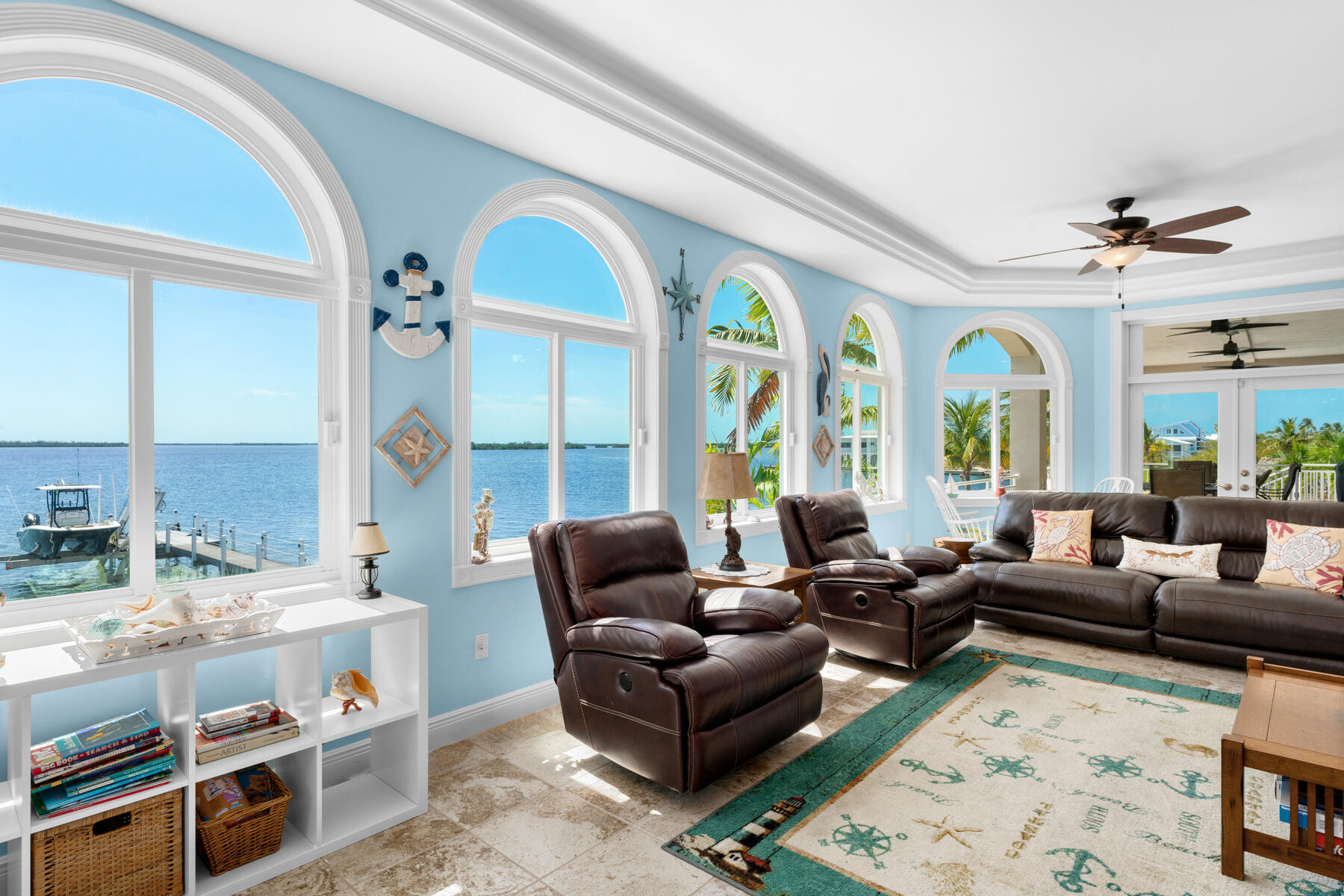 3742 Sea Grape Street Big Pine Key, FL 33043 - Photo 44 of 110 a living room with furniture fireplace and a large window