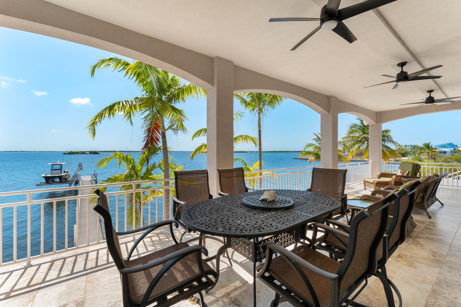 3742 Sea Grape Street Big Pine Key, FL 33043 - Photo 45 of 110 a view of a dining room with furniture window and outside view