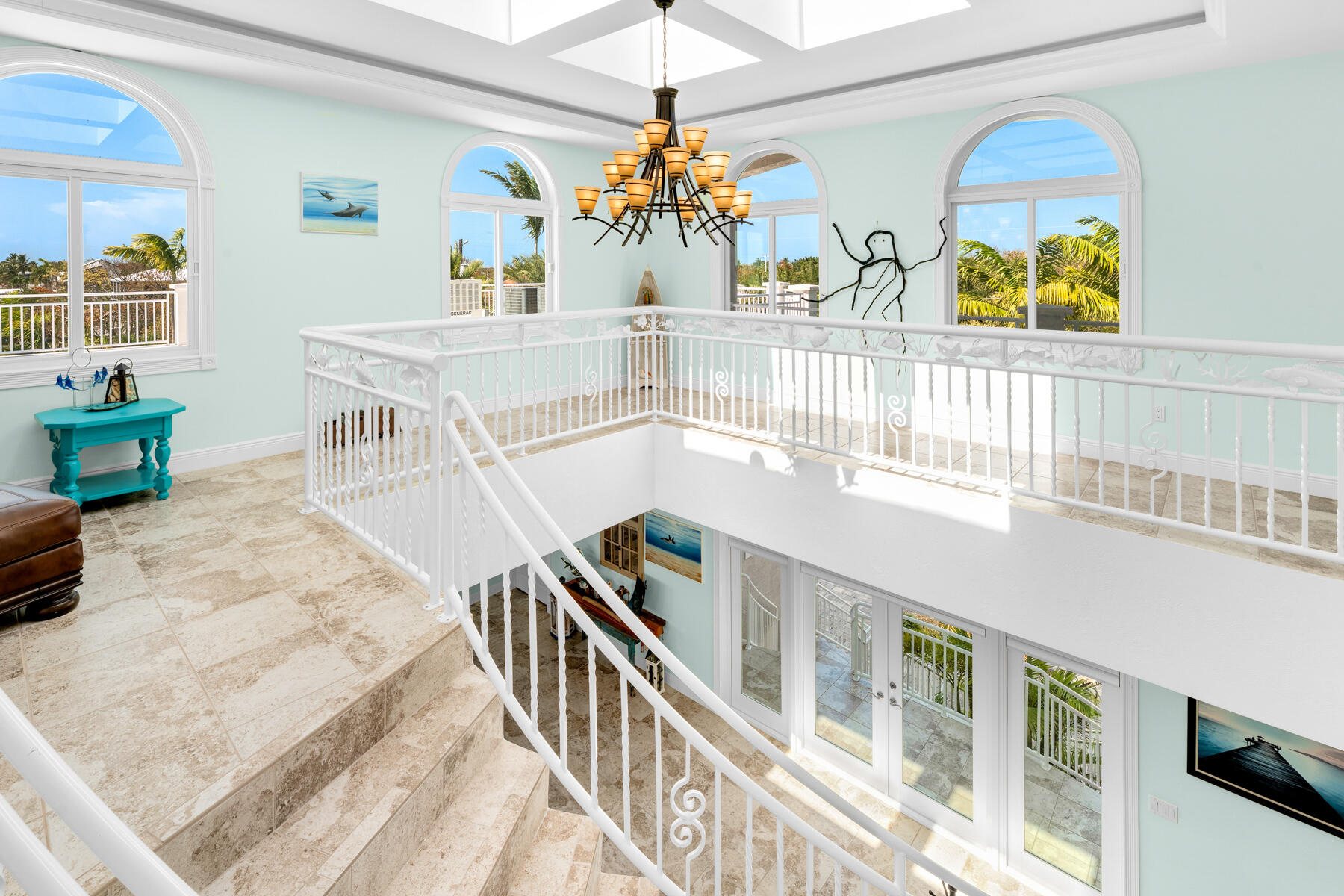 3742 Sea Grape Street Big Pine Key, FL 33043 - Photo 51 of 110 a view of a dining room with furniture and a chandelier