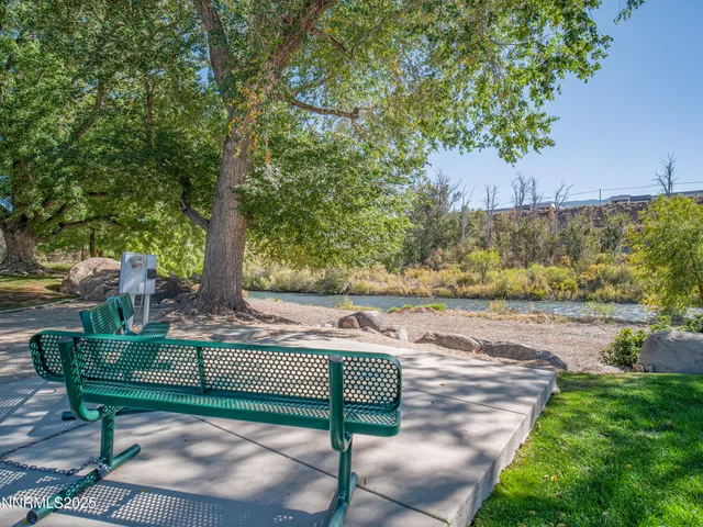 a view of a bench in a yard