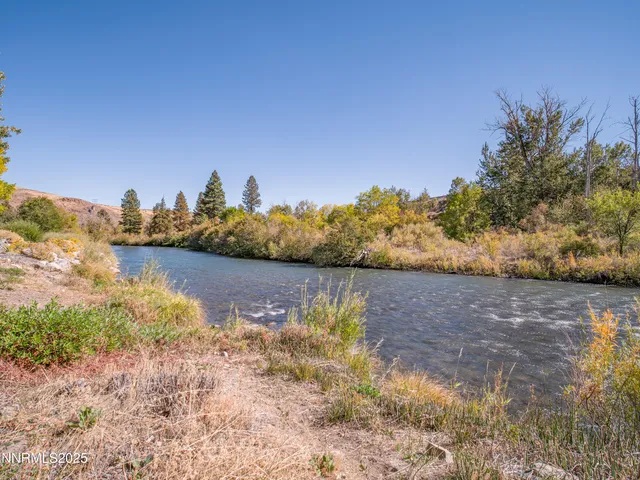 a view of a lake with a mountain in the background