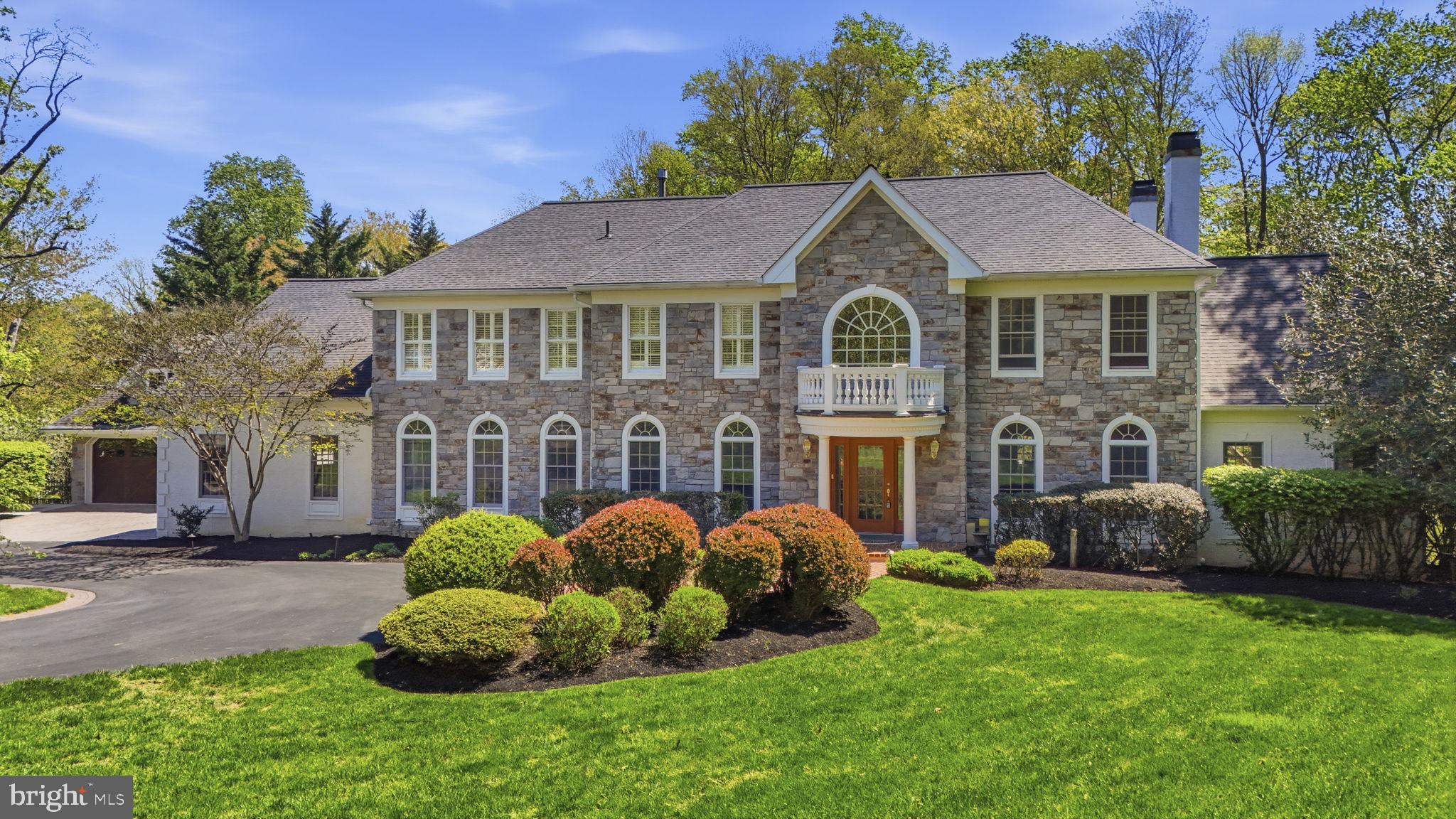 195 Carnoustie Way Media, PA 19063 - Photo 1 of 78 Elegant stone-front residence with lush gardens.