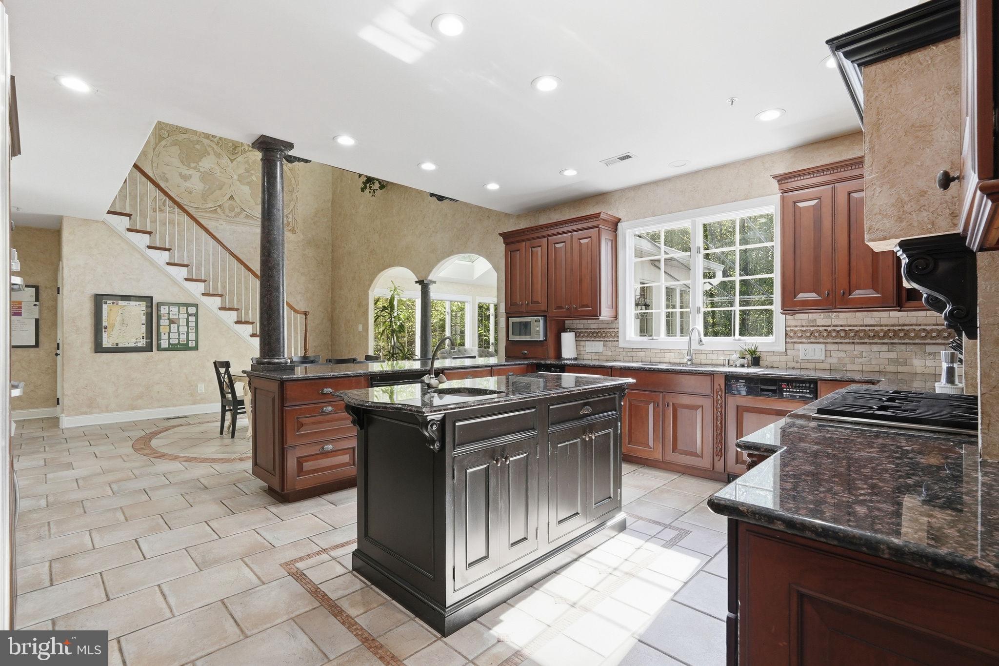 195 Carnoustie Way Media, PA 19063 - Photo 17 of 78 Elegant kitchen with rich cabinetry.