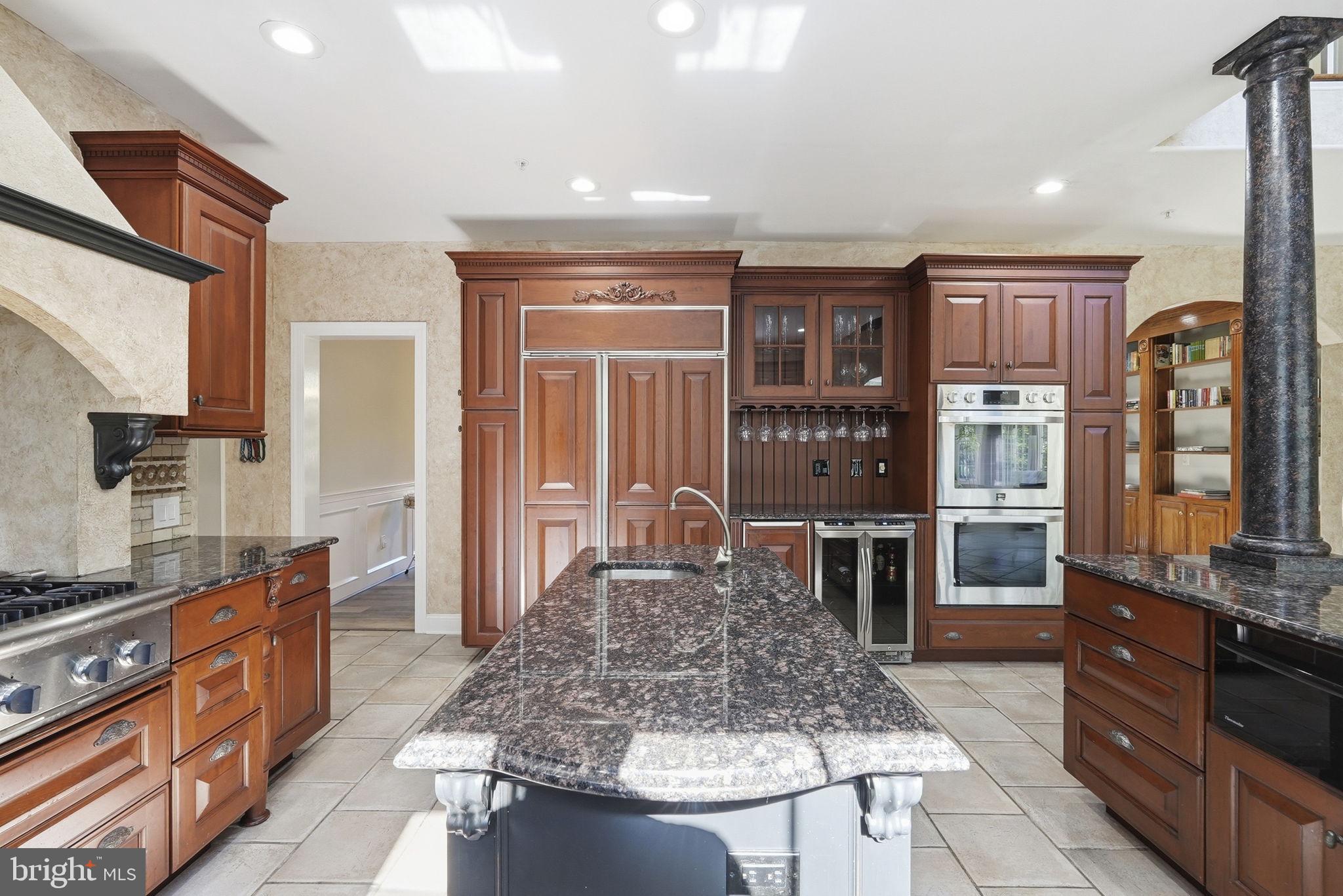 195 Carnoustie Way Media, PA 19063 - Photo 19 of 78 Elegant kitchen with rich cabinetry.