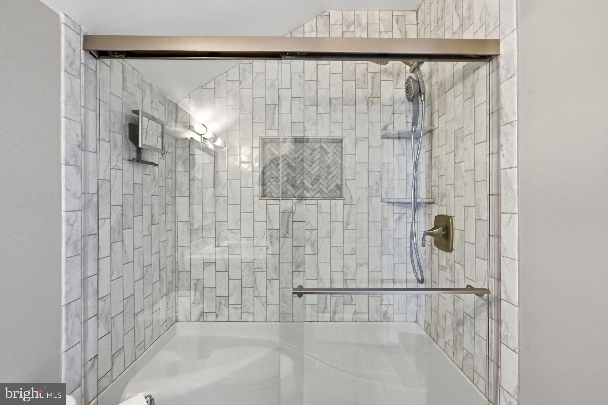 195 Carnoustie Way Media, PA 19063 - Photo 34 of 78 Sleek marble shower with modern fixtures.
