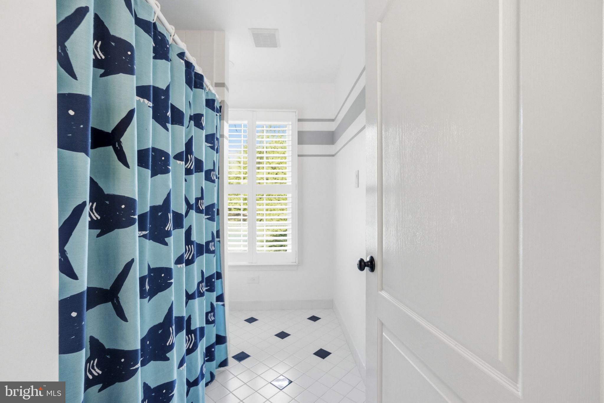 195 Carnoustie Way Media, PA 19063 - Photo 38 of 78 Whimsical shark-themed bathroom retreat.