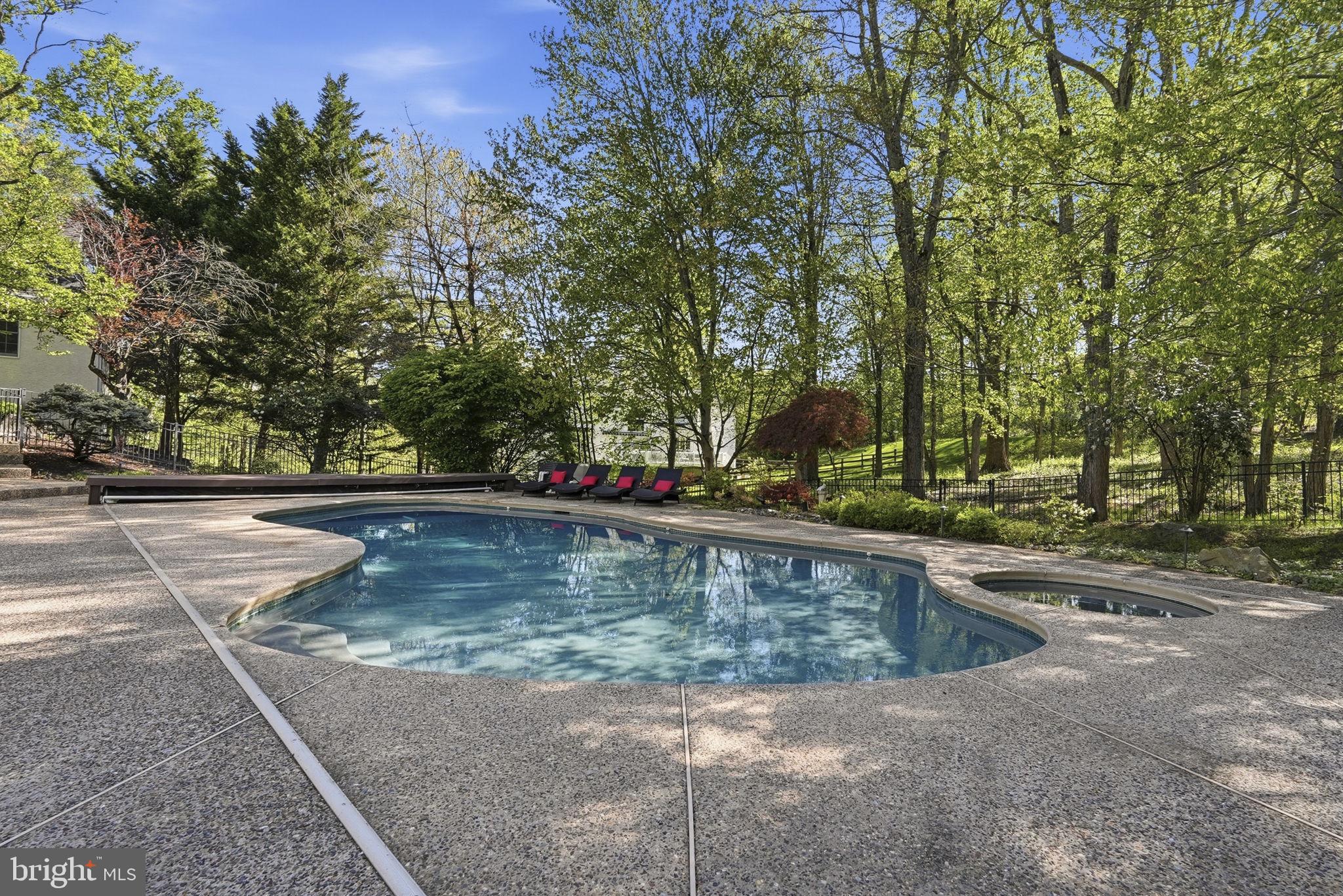 195 Carnoustie Way Media, PA 19063 - Photo 60 of 78 Serene poolside retreat in nature.