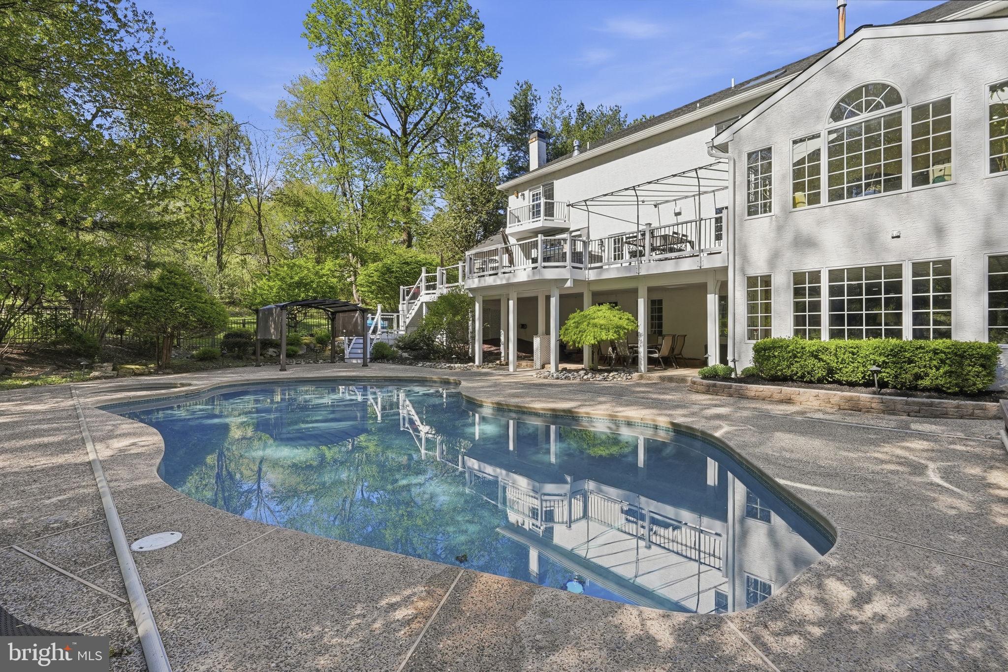 195 Carnoustie Way Media, PA 19063 - Photo 61 of 78 Serene poolside retreat in nature.