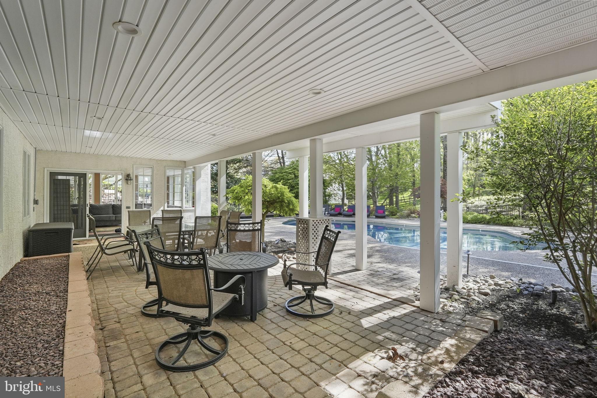 195 Carnoustie Way Media, PA 19063 - Photo 62 of 78 Serene patio by the sparkling pool.