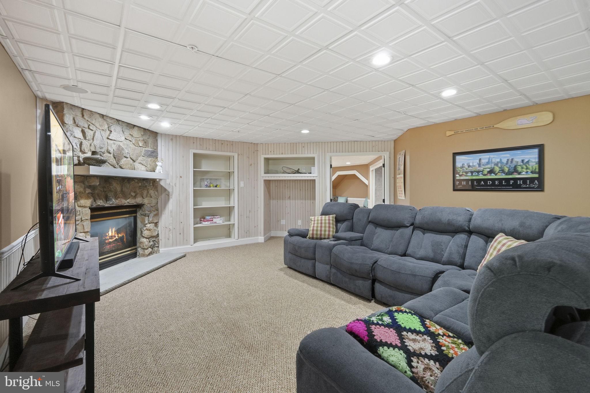 195 Carnoustie Way Media, PA 19063 - Photo 67 of 78 Cozy retreat with stone fireplace.