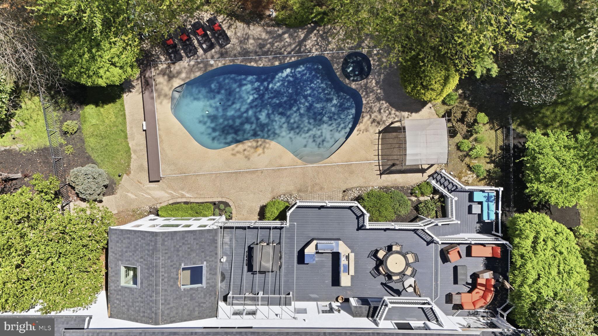 195 Carnoustie Way Media, PA 19063 - Photo 7 of 78 Serene oasis with pool and greenery.